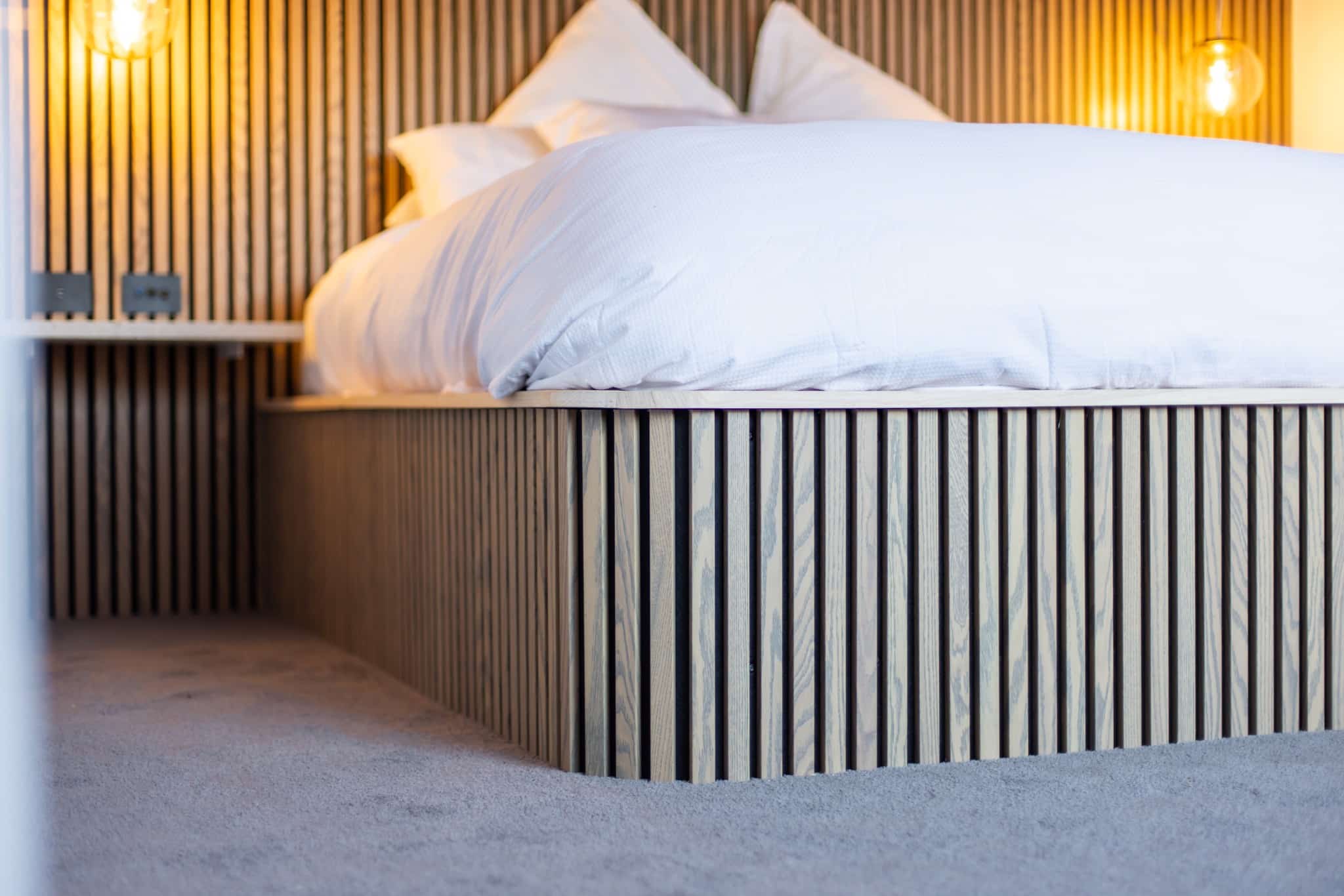 Zeus Interior ceres premium acoustic wood panels used as a bedframe at a home in Newtown